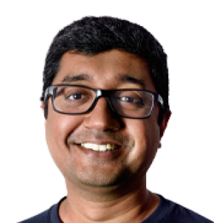 Headshot of Ashok Subramanian, Chief Technology Officer, wearing a black shirt
