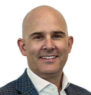 Headshot of Jean du Preez, Chief Financial Officer at Taylor & Francis, wearing a white shirt and a grey, tweed blazer